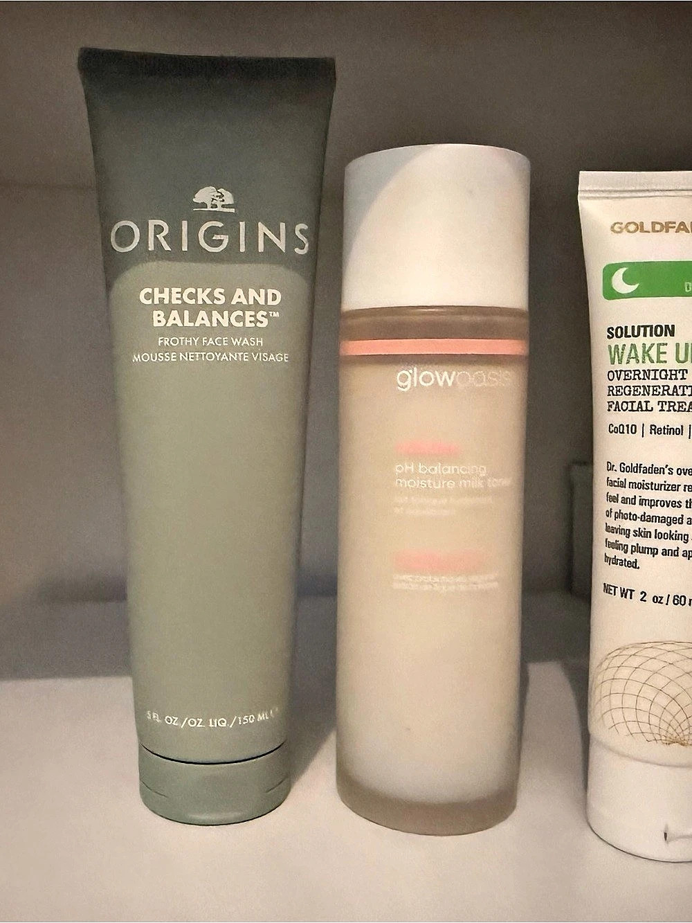 Origins checks & balances face wash, glowoasis milk toner, goldfaden md facial t